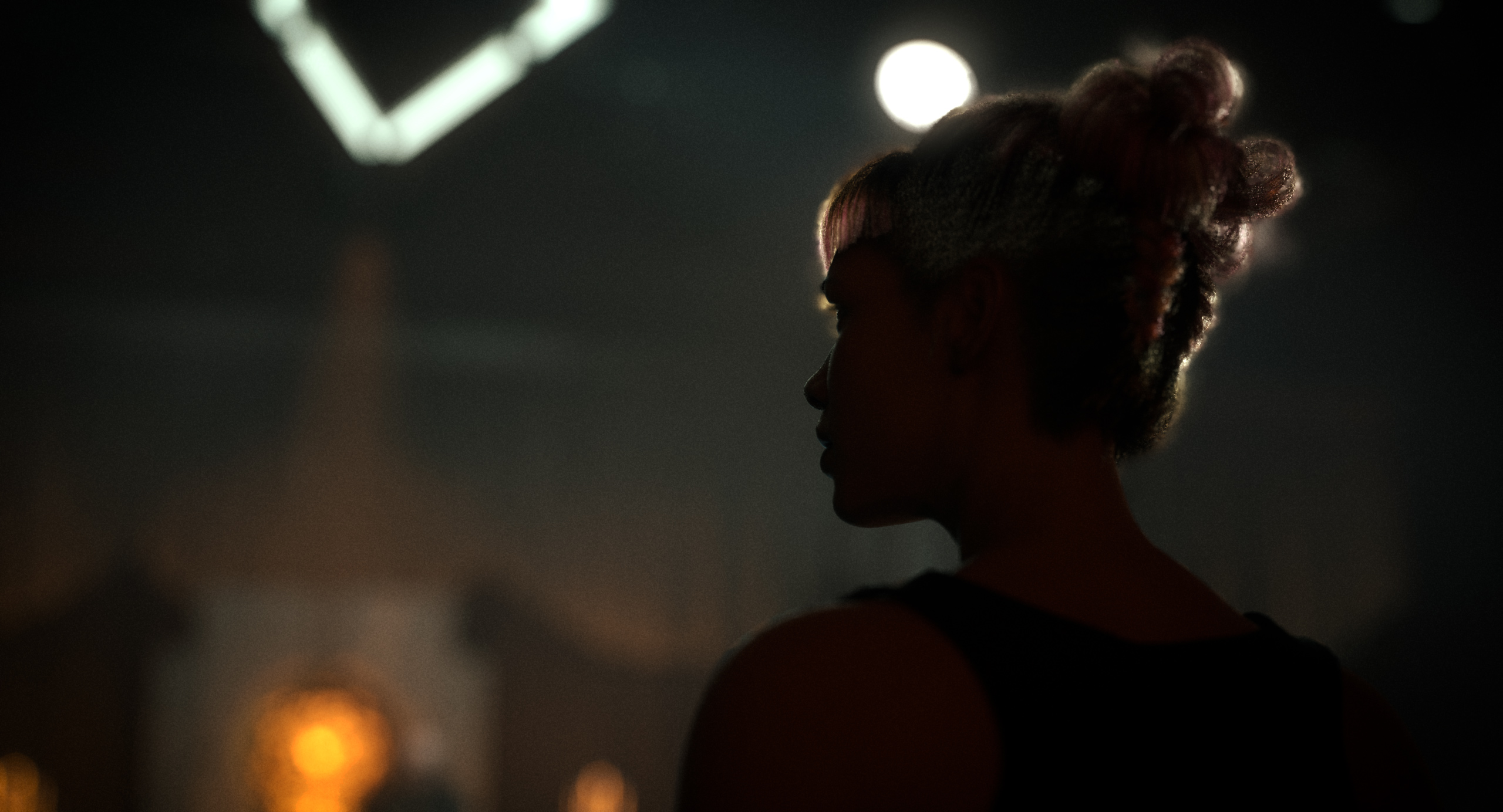 Membership — silhouette, cinematic bokeh